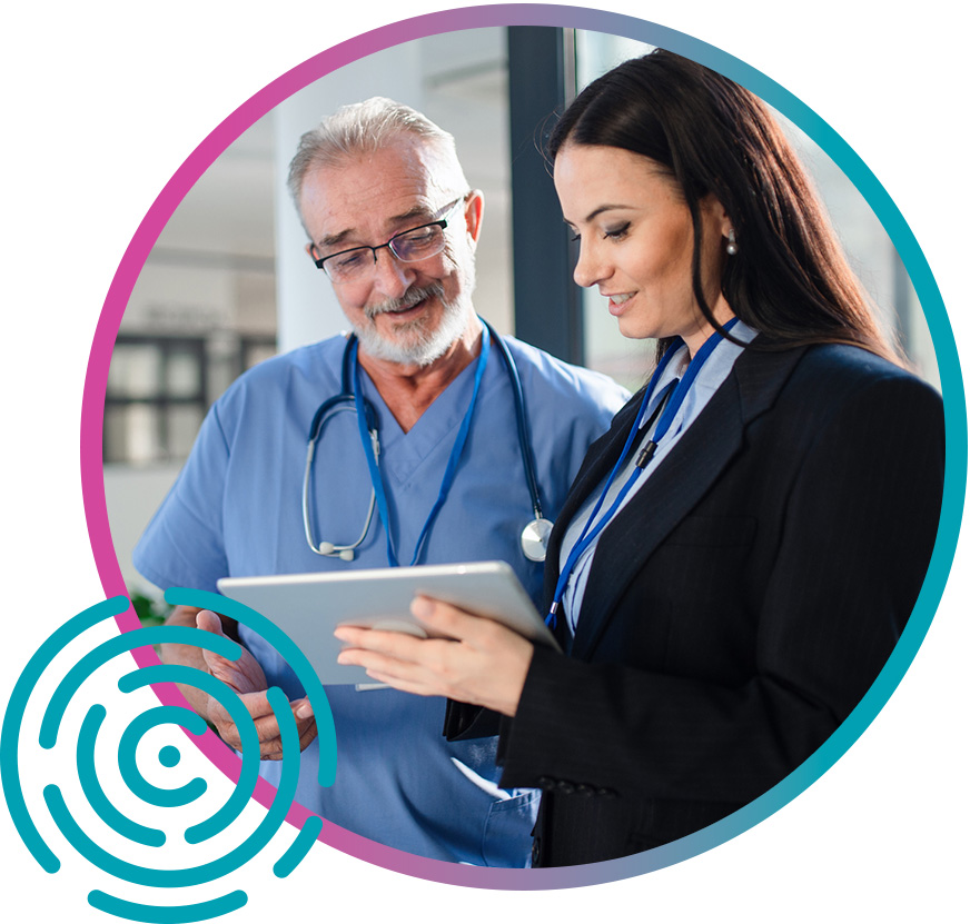 Clinician and professional looking at tablet Provider and PI expert using a tablet together to review diagnosis codes and do a medical chart review