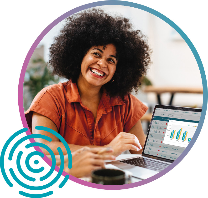 Woman smiling by data on laptop Payment integrity expert automates prepayment claim reviews to improve payment integrity